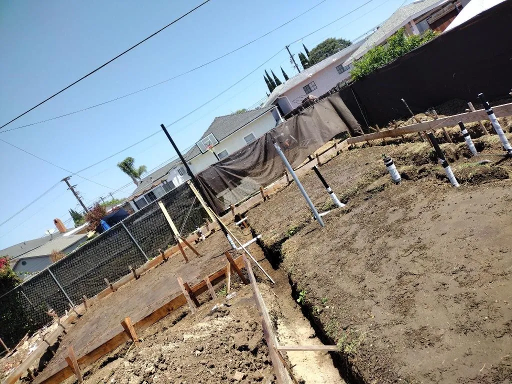 Foundation forms and rebar layout for a ground-up residential build